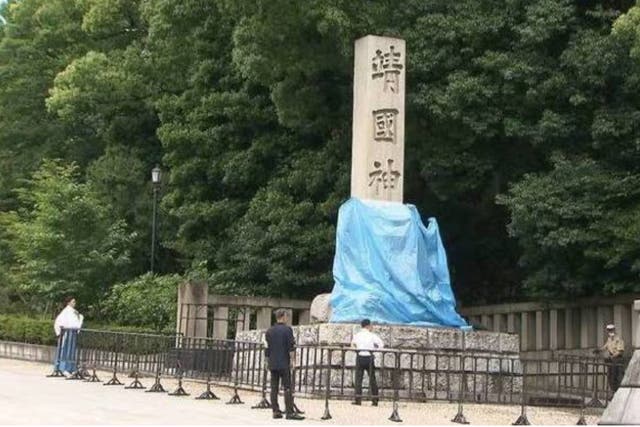 <p>The red graffiti, spray-painted on a stone pillar at the entrance of Yasukuni Shrine, was discovered early Saturday morning</p>