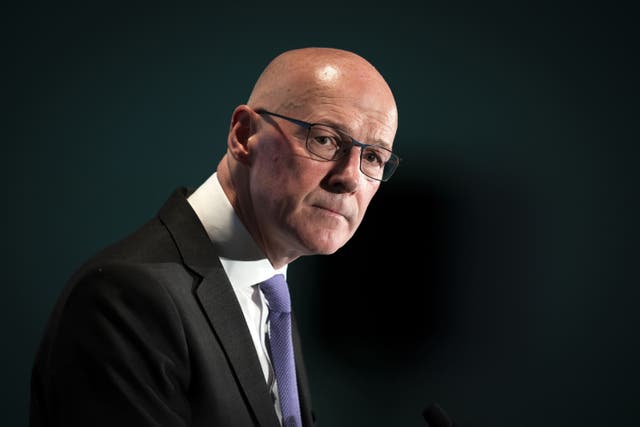 John Swinney said the Tories have been working against Holyrood for some time (Jane Barlow/PA)