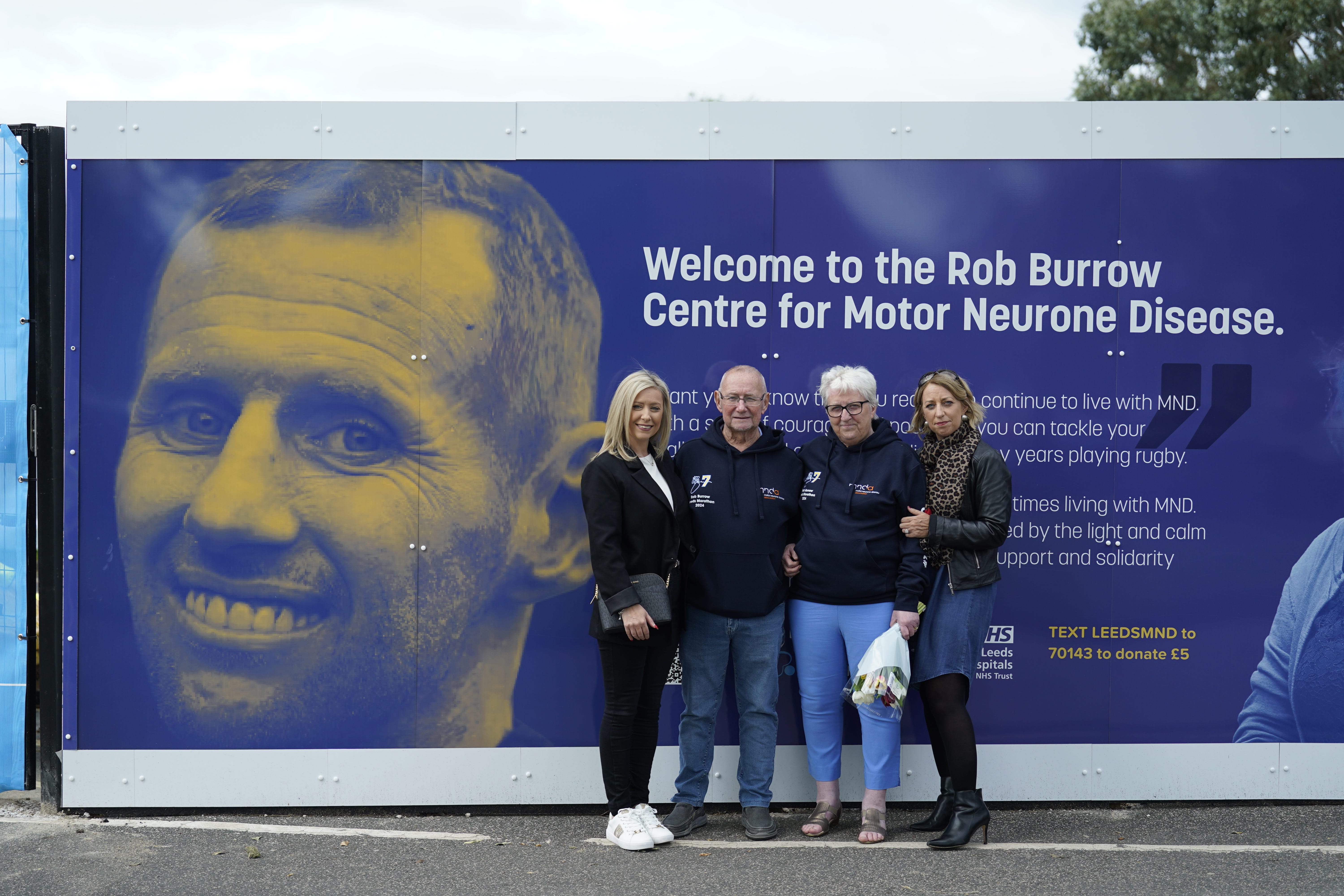 Rob Burrow's family (l to r) sister Claire Burnett, father Geoff, mother Irene and sister Joanne Hartshorn during the groundbreaking ceremony at the new central site (Danny Lawson/PA)