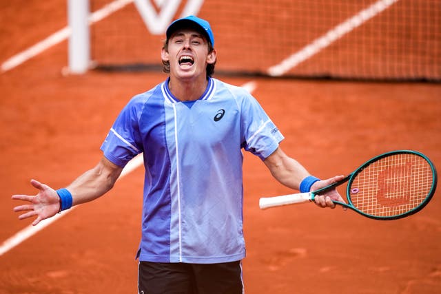 Alex De Minaur celebrates after beating Daniil Medvedev (Christophe Ena/AP)