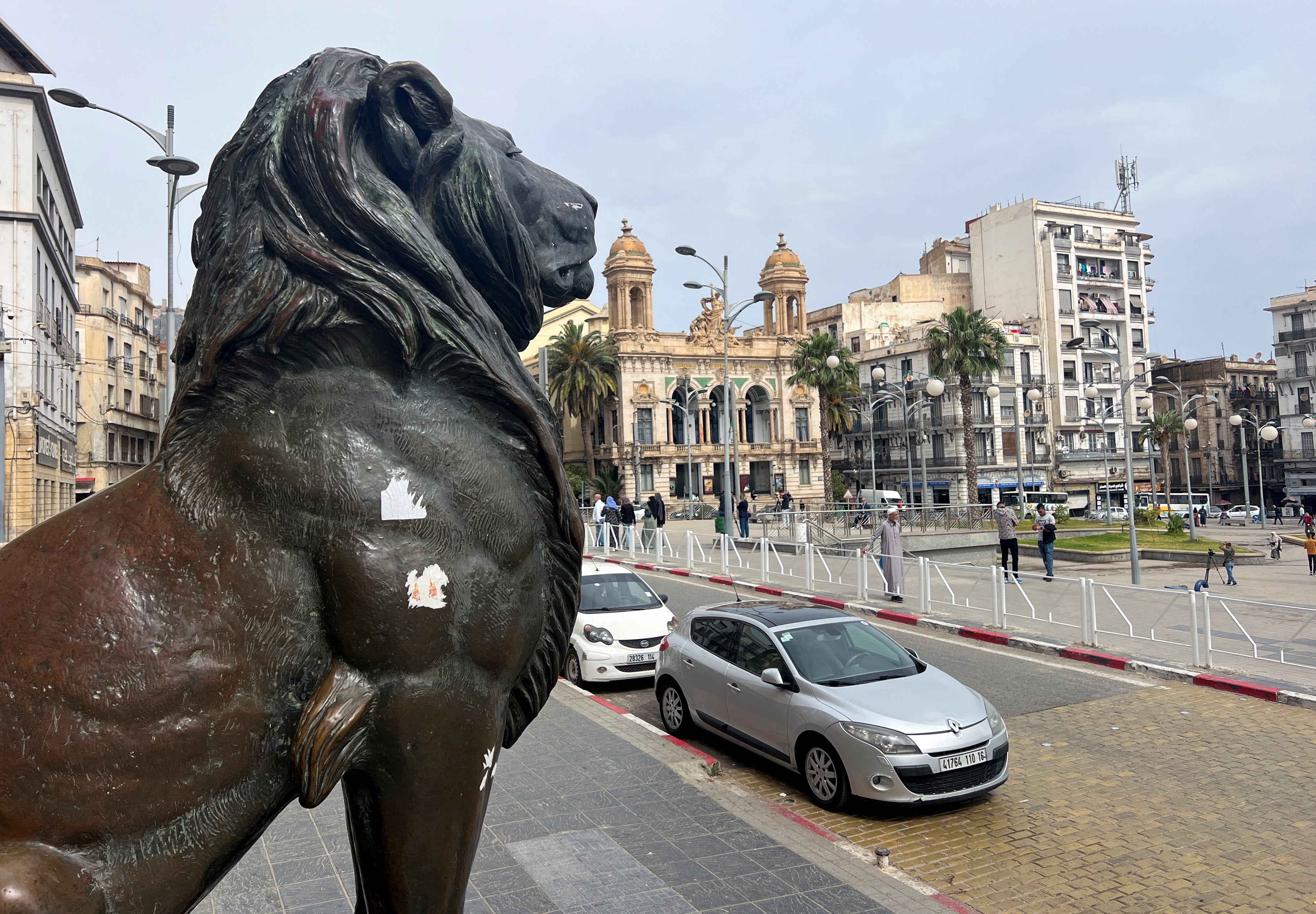 A lion statue at the central square of Place d'Armes in Oran