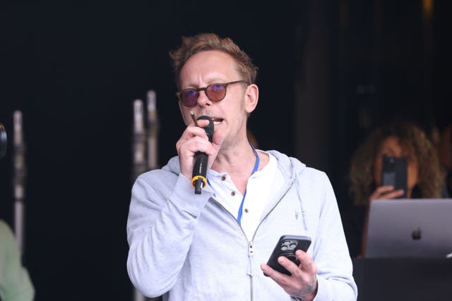 Laurence Fox speaking during the protest march at Parliament Square (David Parry/PA)