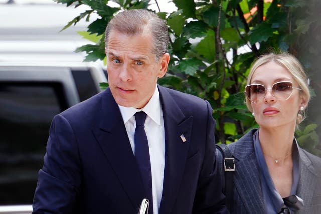 <p>Hunter Biden, son of President Joe Biden, joined by his wife Melissa Cohen Biden, arrives at court on June 3, 2024 in Wilmington, Delaware</p>