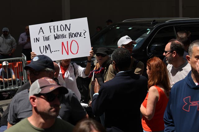 <p>People gather as Donald Trump holds a press conference at Trump Tower on May 31, 2024 in New York City. Half of Americans support the guilty conviction against Donald Trump, according to a new poll </p>