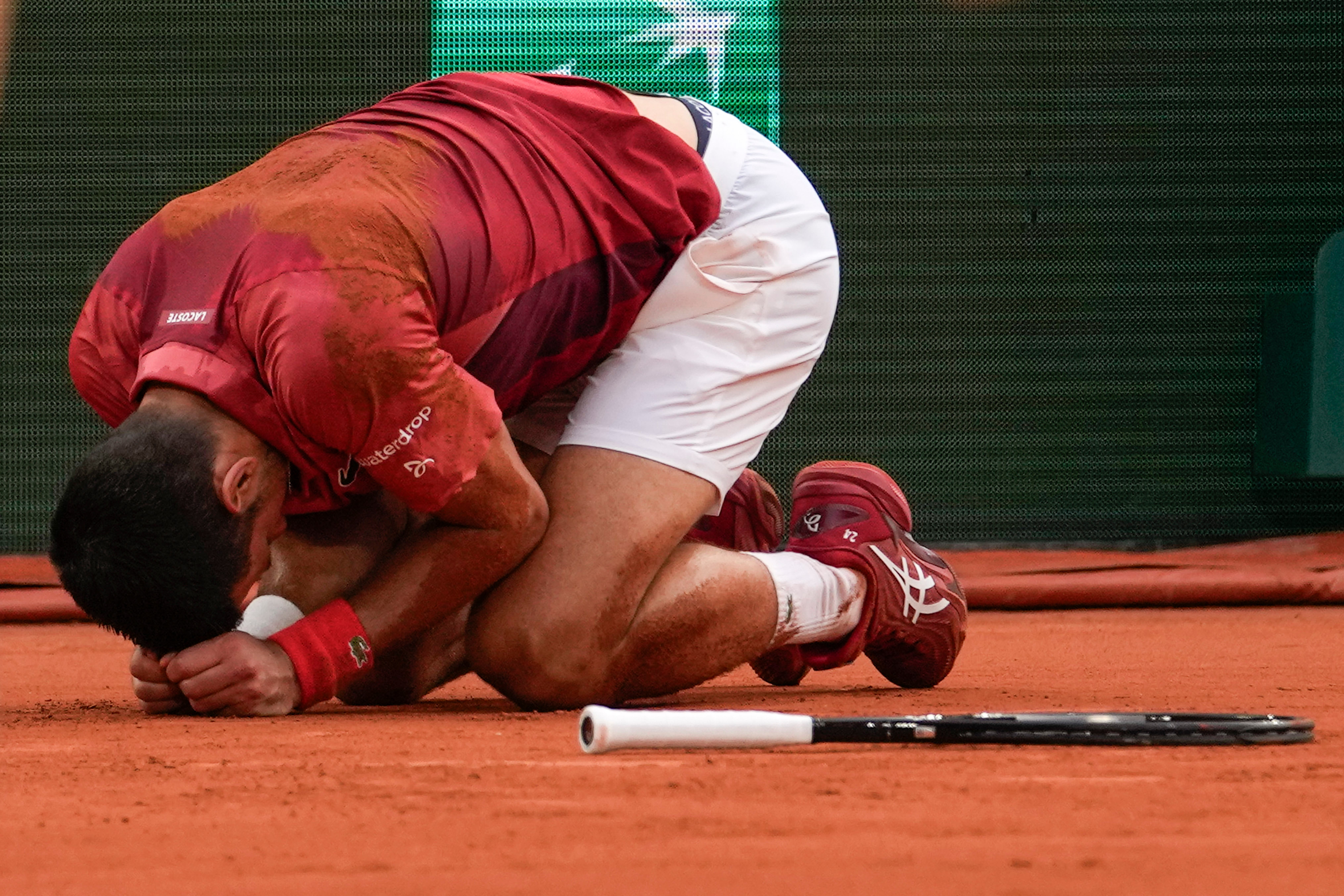 Novak Djokovic battled through injury during his longest-ever match at the French Open