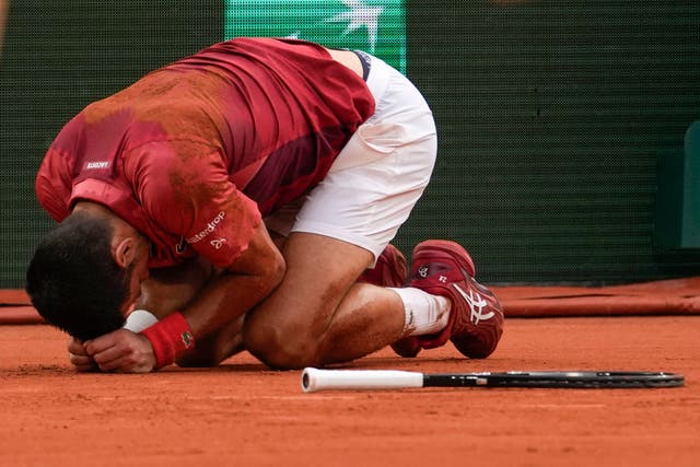 Novak Djokovic won his longest ever match at Roland Garros (Thibault Camus/AP)