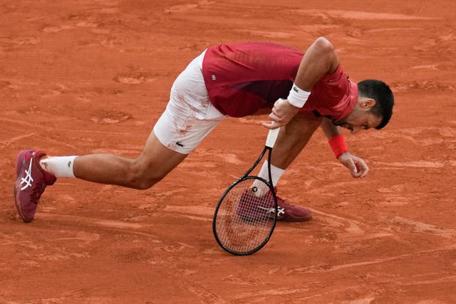 <p>Novak Djokovic blamed the slippery court for the injury</p>