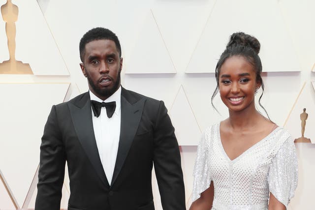 <p>Sean Combs (left) and his daughter Chance at the Oscars in March 2022. Chance Combs, 18, posted photos on Instagram on Sunday showing her holding her diploma while wearing a graduation cap and gown, but her father was nowhere in sight.  </p>