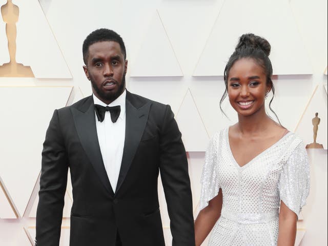 <p>Sean Combs (left) and his daughter Chance at the Oscars in March 2022. Chance Combs, 18, posted photos on Instagram on Sunday showing her holding her diploma while wearing a graduation cap and gown, but her father was nowhere in sight.  </p>