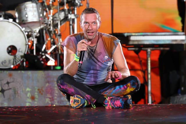 <p>Chris Martin of Coldplay performs at Rose Bowl Stadium on 30 September 2023 in Pasadena, California</p>