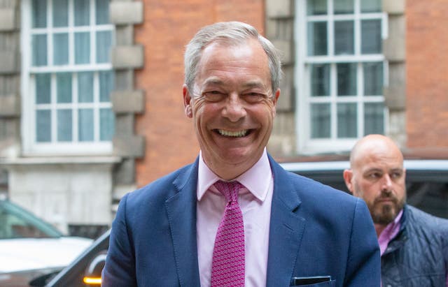 <p>Nigel Farage prepares for the morning broadcast round at Westminster on Tuesday </p>