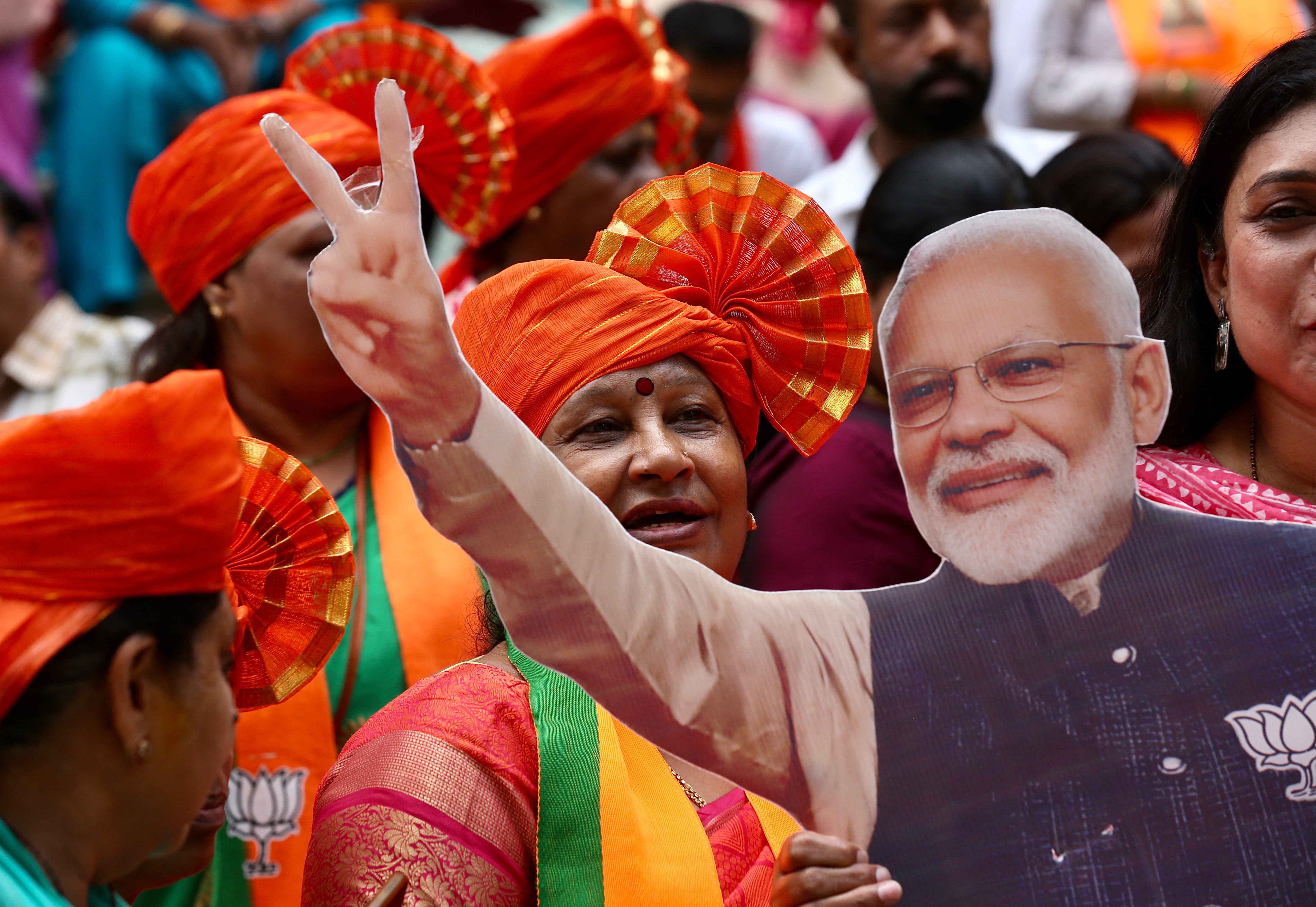 Bharatiya Janata Party (BJP) supporters celebrate at BJP headquarters in Bangalore, India, 04 June 2024