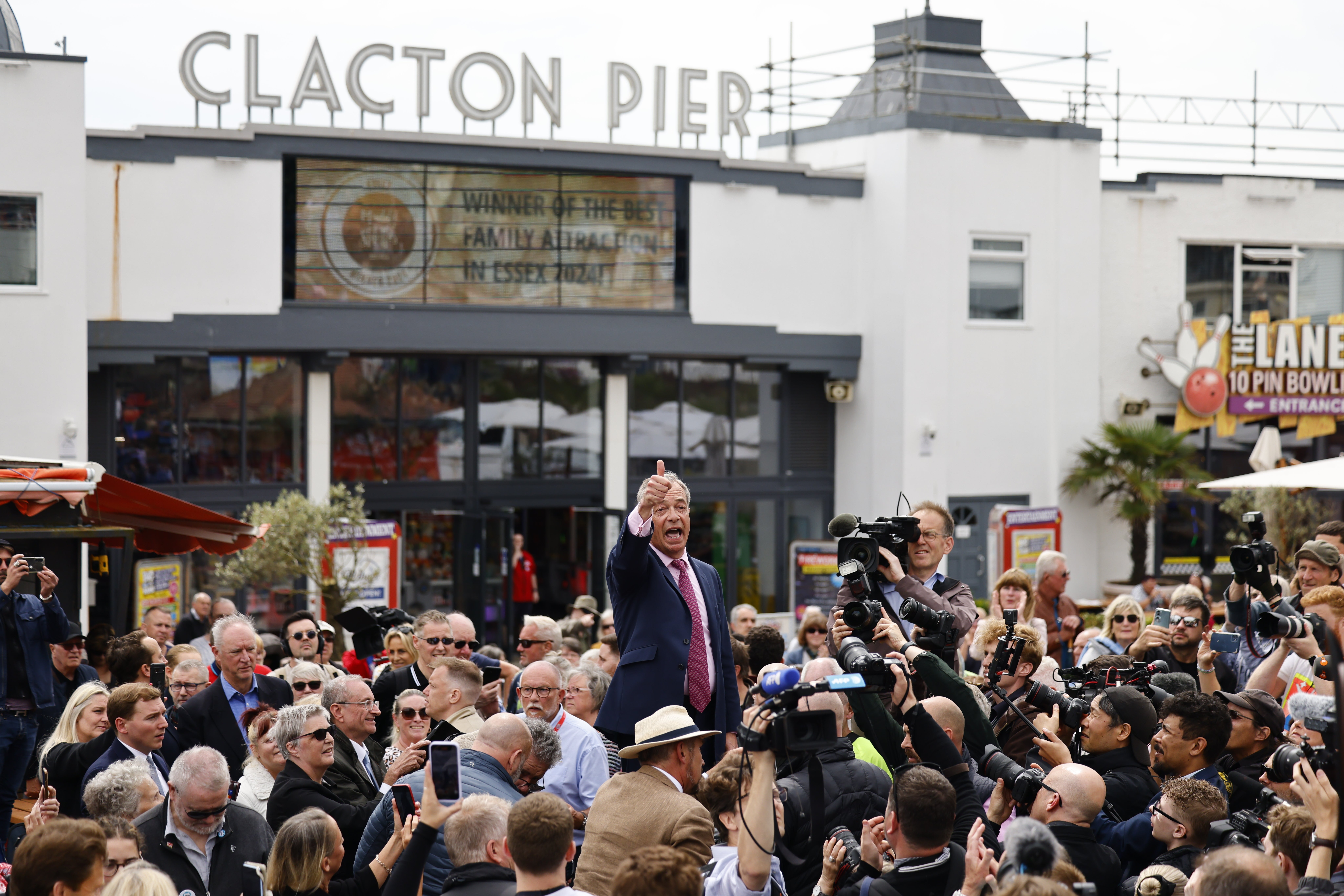 Thumbs up from Nigel Farage as he greets the crowd outside Clacton Pier