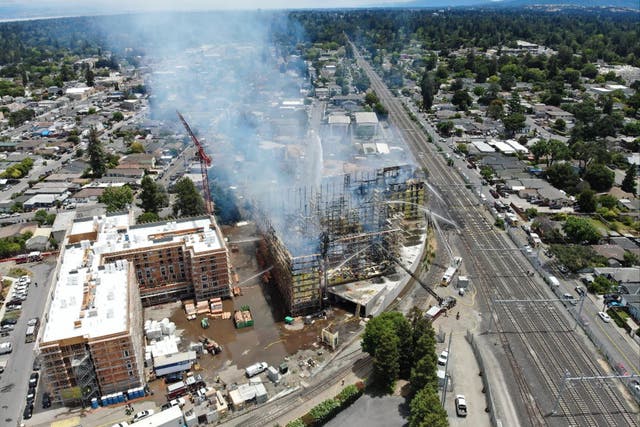 <p>An affordable housing building, part of a $155m community project, burned down in northern California on Monday Morning</p>