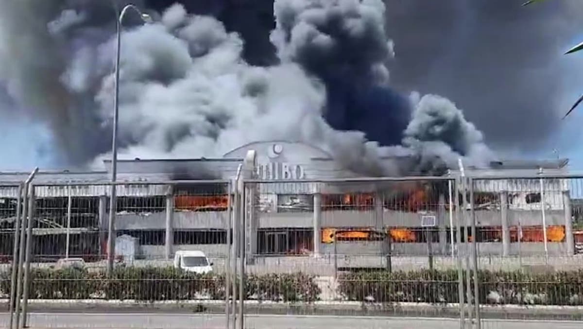 Huge Ibiza warehouse inferno delays dozens of flights with smoke seen ...