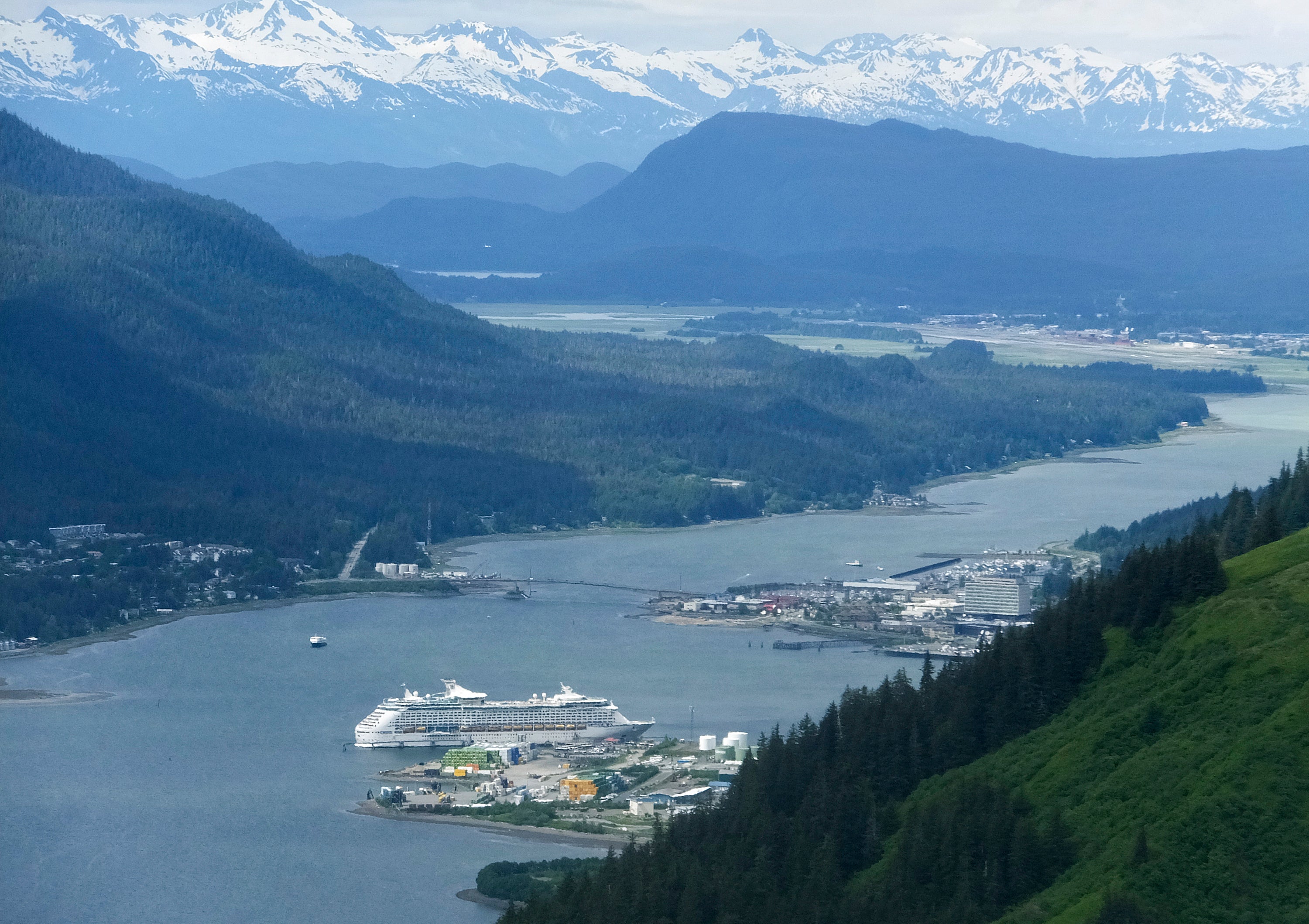 A cruise ship sits docked near downtown Juneau, Alaska, Sunday, June 4, 2017