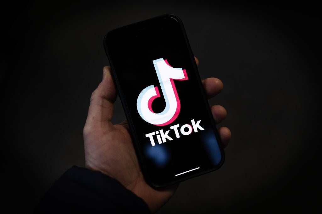 A TikTok logo is displayed on an iPhone on 28 February, 2023 in London, England