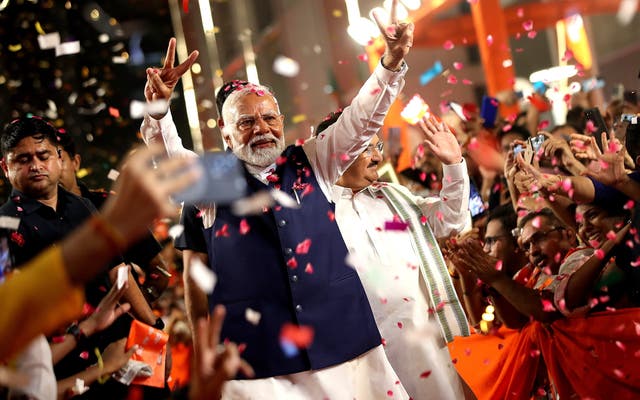 <p>Bharatiya Janata Party (BJP) leader and Indian Prime Minister Narendra Modi (C)  arrives at the party headquarters to deliver a victory speech, in New Delhi</p>