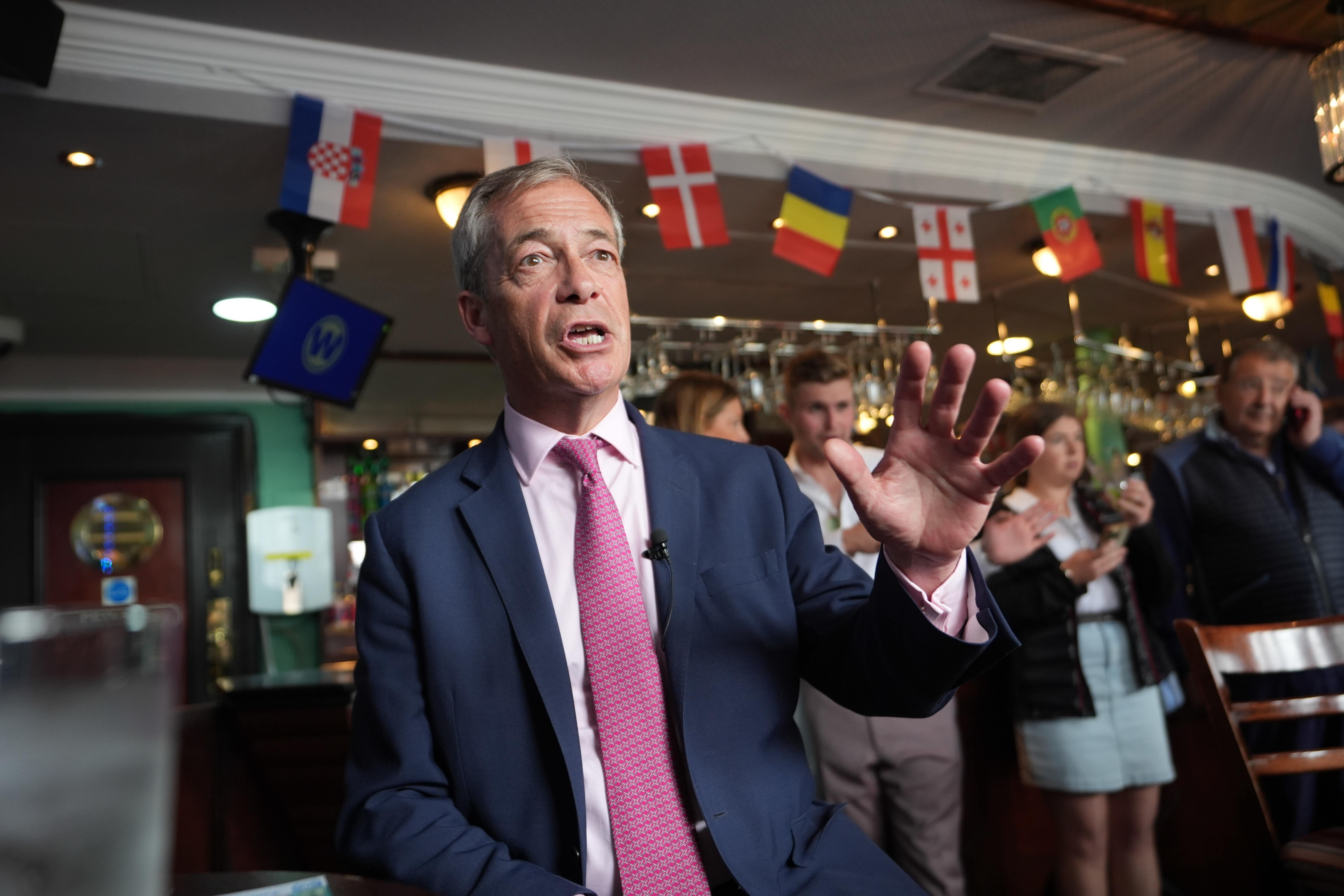 The event will mark Mr Farage’s first debate appearance since his shock takeover as leader of Reform UK (James Manning/PA)