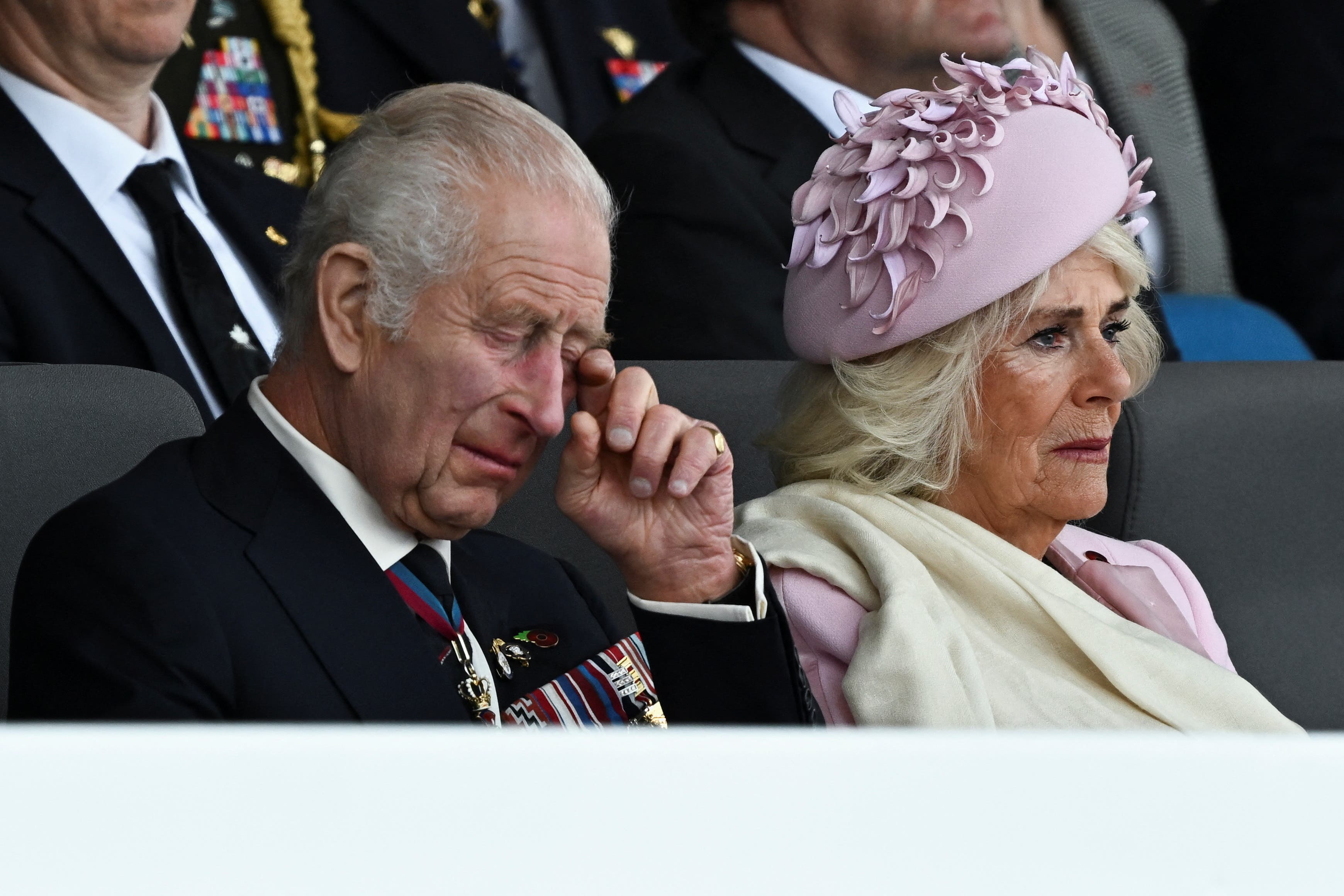 Charles also appeared to become emotional during the event