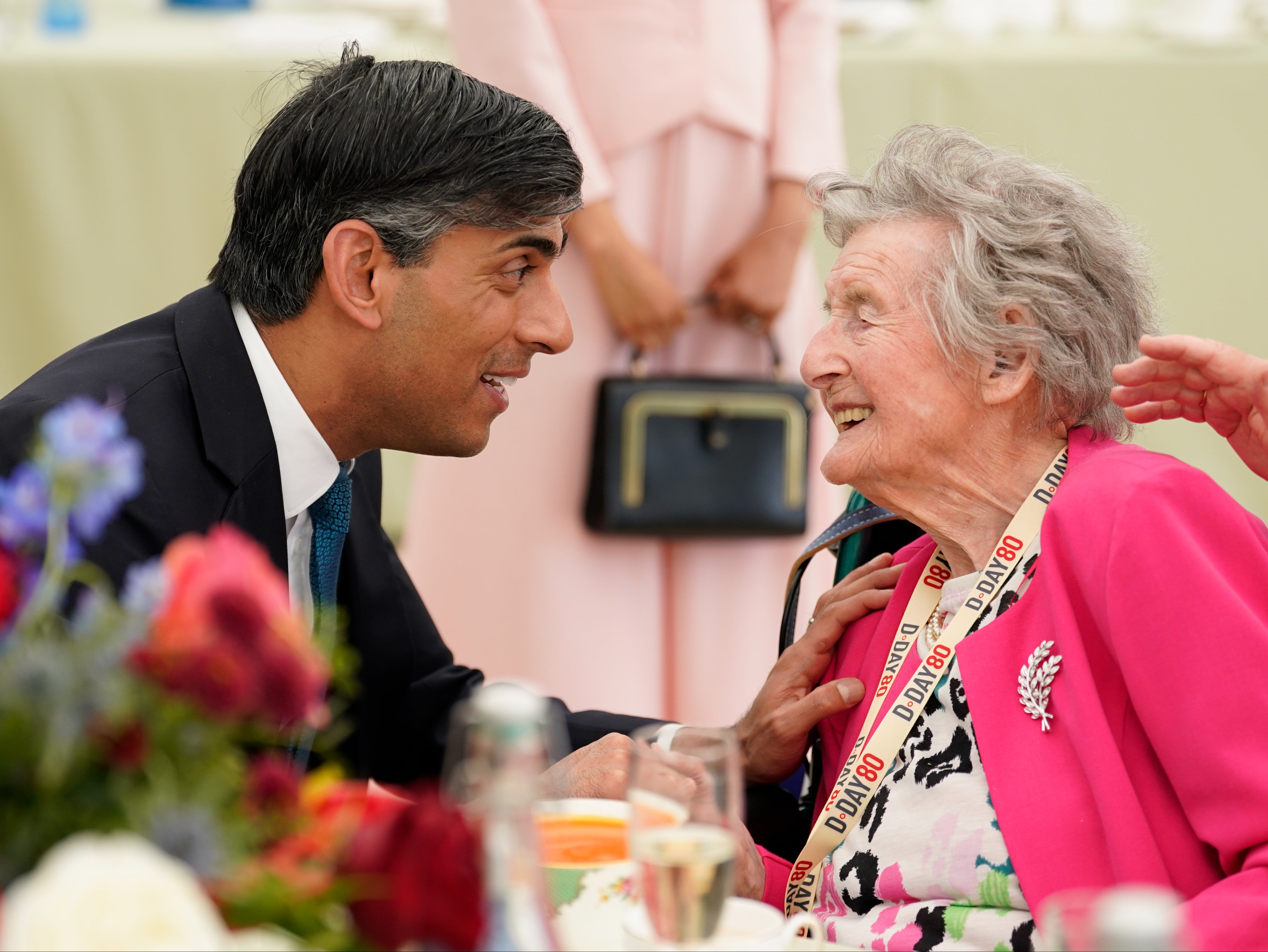 Rishi Sunak meets 100-year-old Wren veteran Marjorie Hutchens during a lunch for veterans and VIPs
