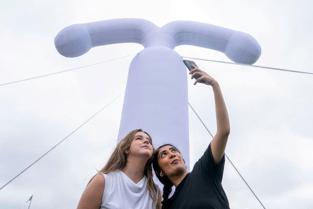 <p>Hannah Tuohy and Meghan Ravi with the group, Americans for Contraception, take a selfie in front of an inflatable IUD on Capitol Hill on June 5, 2024 </p>