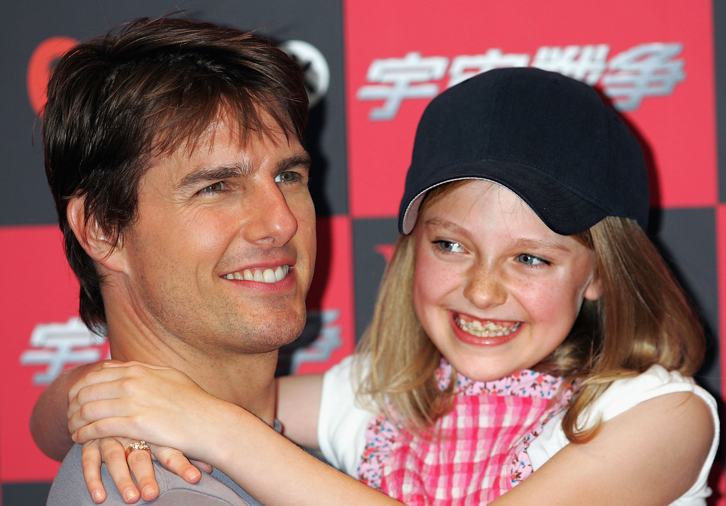 Tom Cruise and Dakota Fanning attend a photo call to promote ‘War of the Worlds’ on June 13, 2005 in Tokyo, Japan