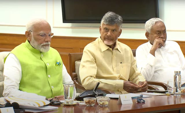 <p> Indian prime minister elect Narendra Modi, left, is sitting next to Telugu Desam Party leader N Chandrababu Naidu, center, and Janata Dal (United) leader Nitish Kumar.</p>