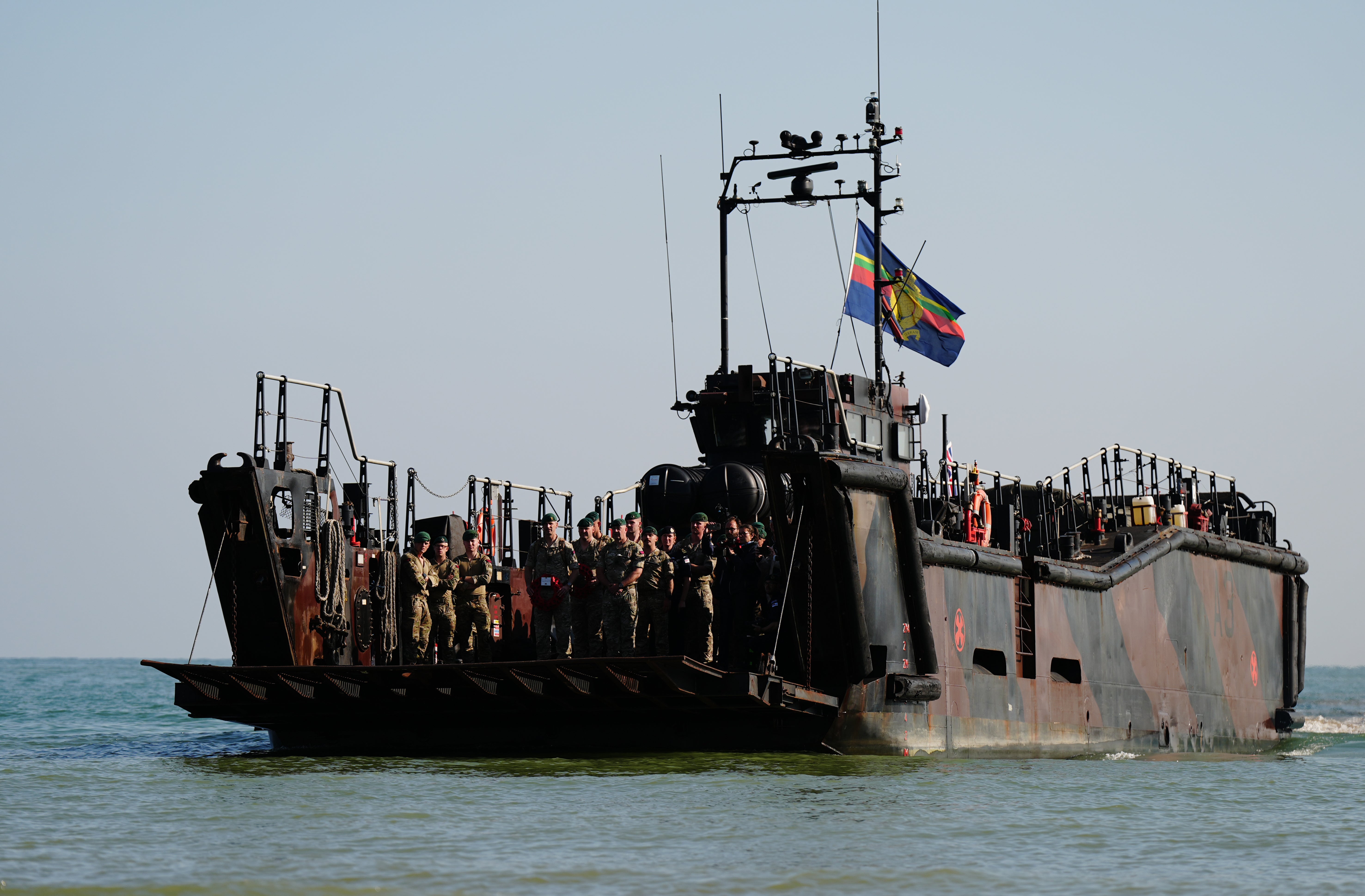 A beach landing by the Royal Marines of 47 Commando at Asnelles before their annual 'yomp' to Port-en-Bessin, in Normandy, France