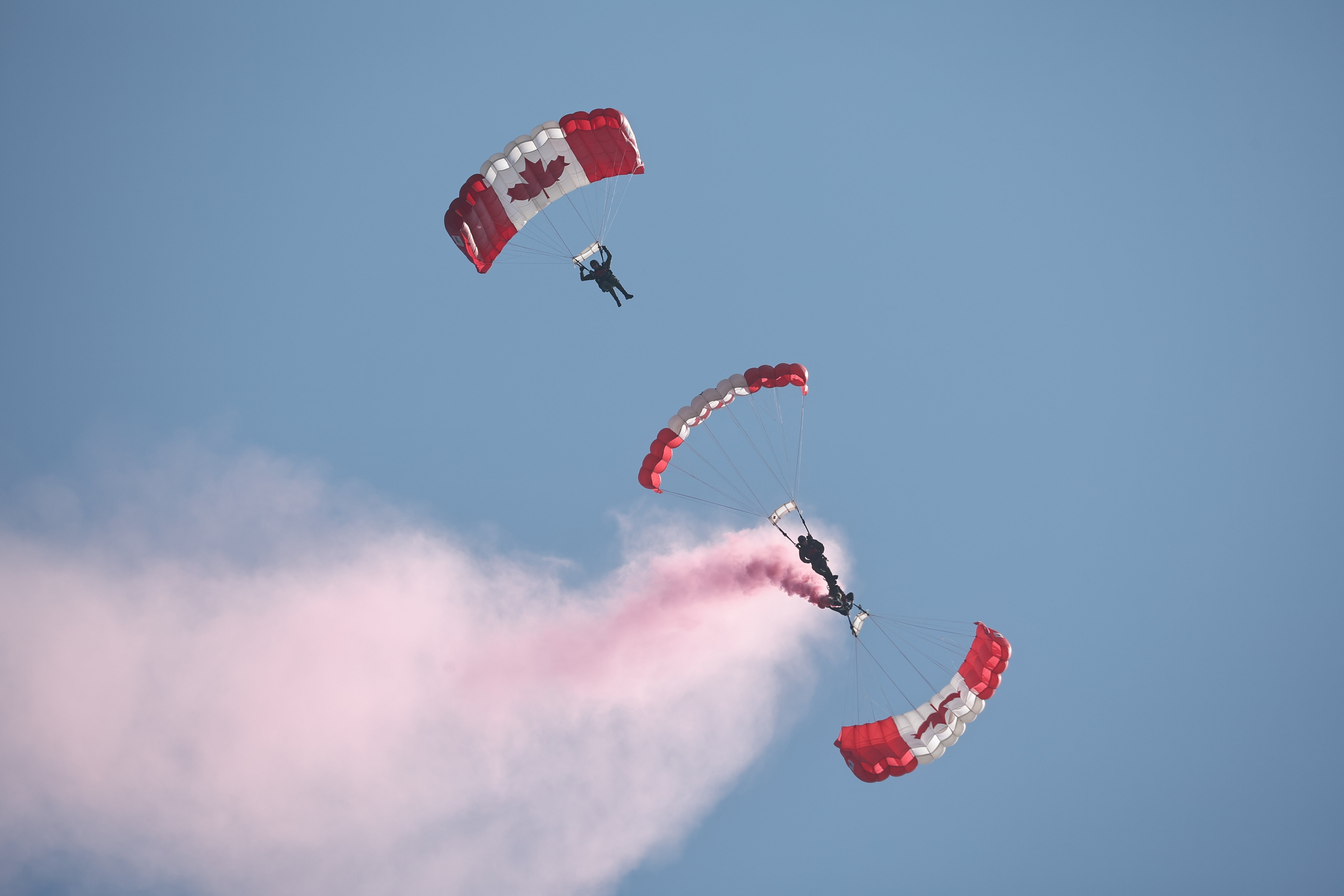 Canadian paratroopers perform during a commemorative ceremony for the 80th anniversary of D-Day landings in Normandy