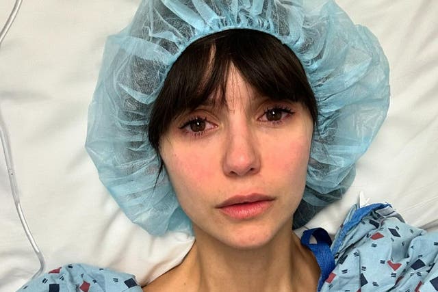 <p>Nina Dobrev in hospital gown and cap as she gives fans a surgery update</p>
