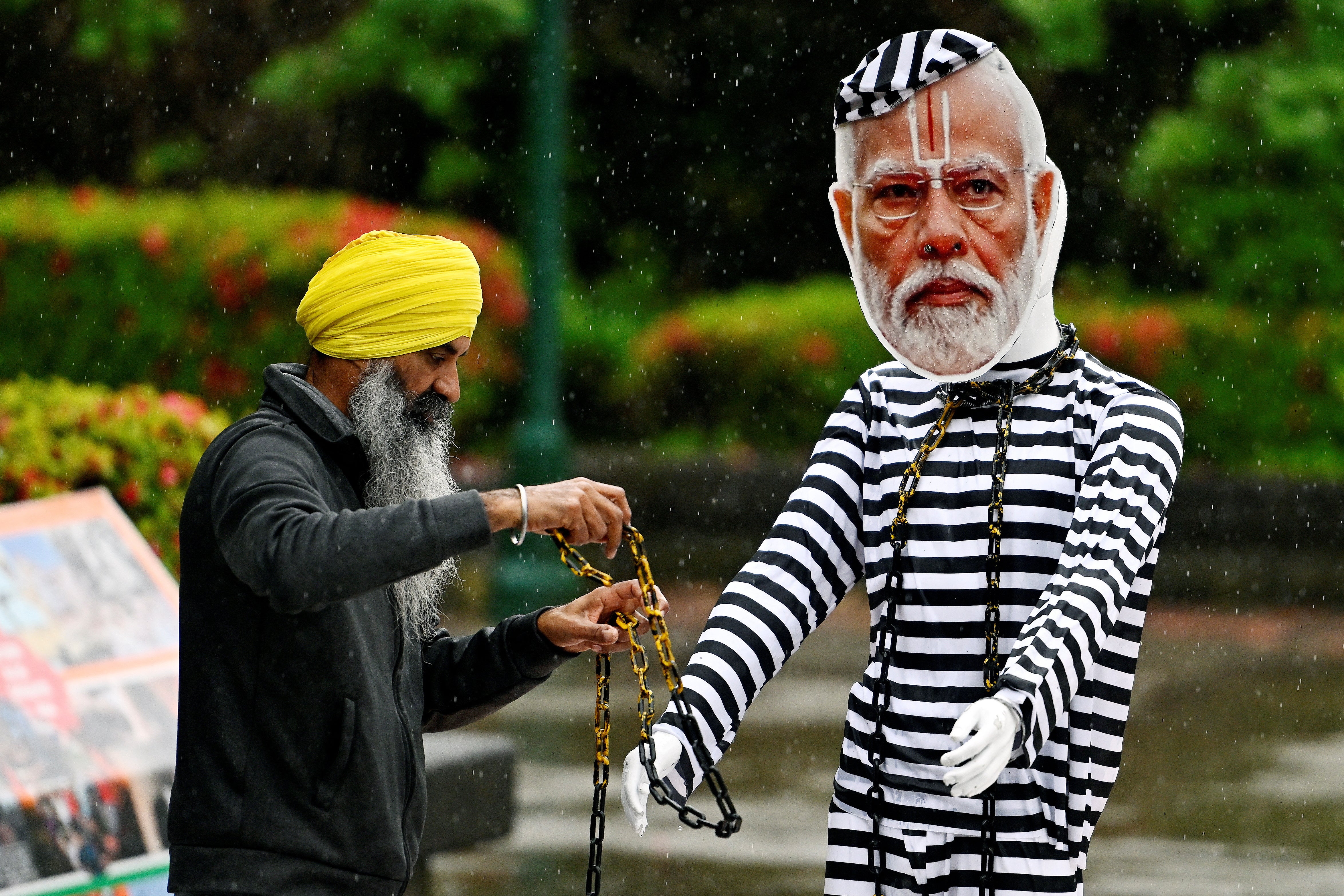 India protested to mannequin with Prime Minister Modi’s picture used in a rally in May