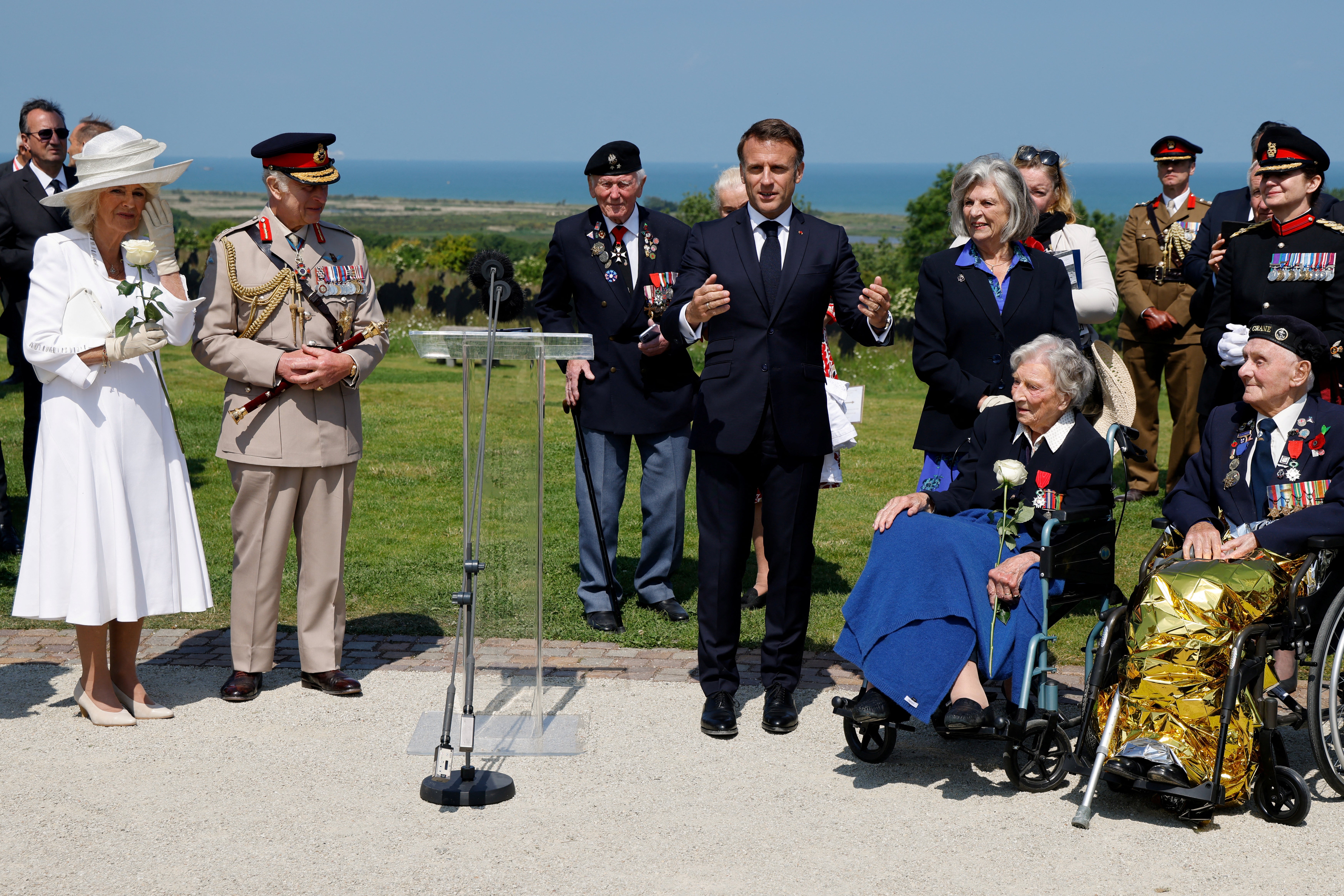 French president Emmanuel Macron speaks after awarding the Legion of Honour to 103-year-old veteran Christian Lamb