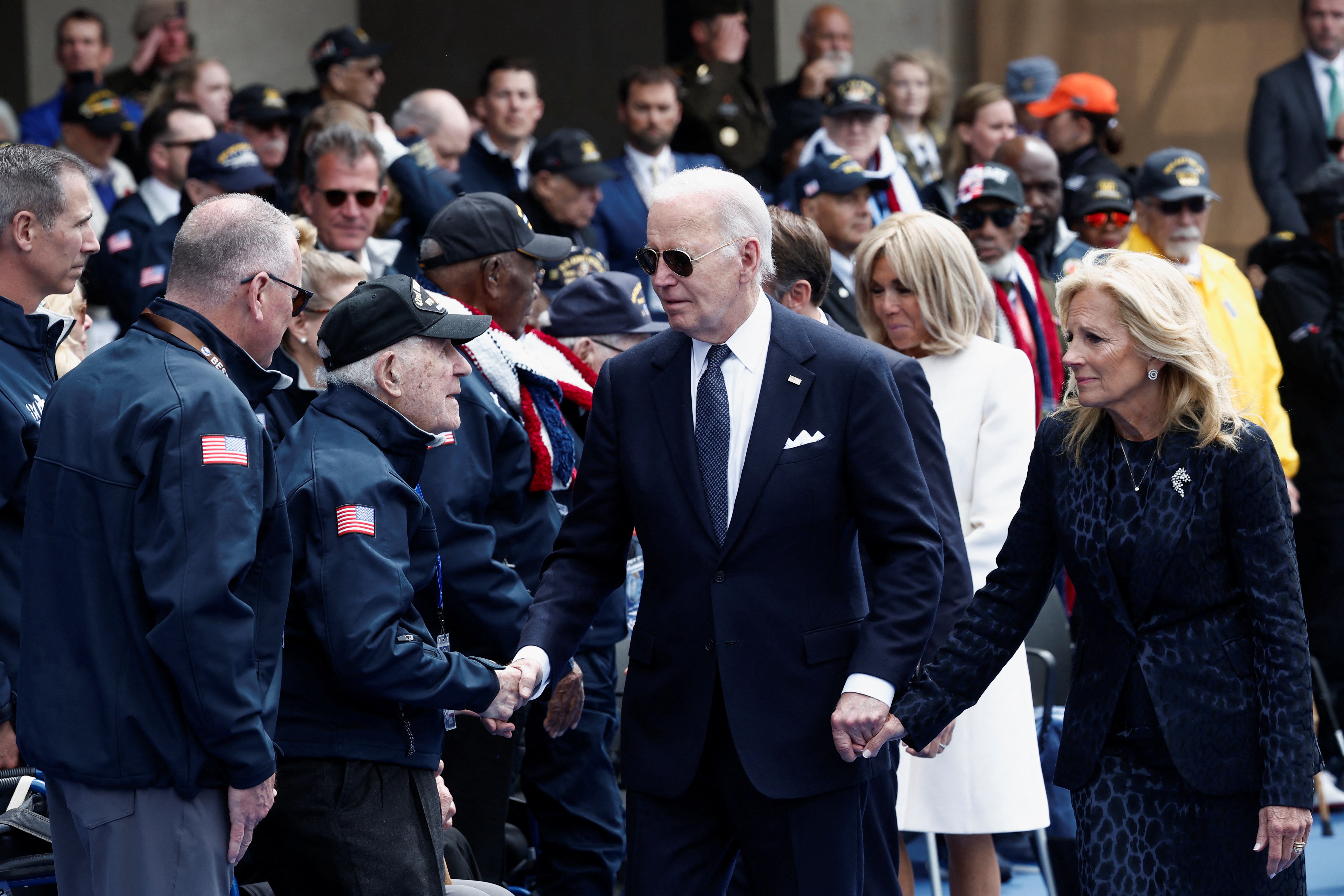 President Joe Biden and first lady Jill Biden attend a ceremony to mark the 80th anniversary of D-Day at the Normandy American Cemetery and Memorial in Colleville-sur-Mer, France, June 6, 2024