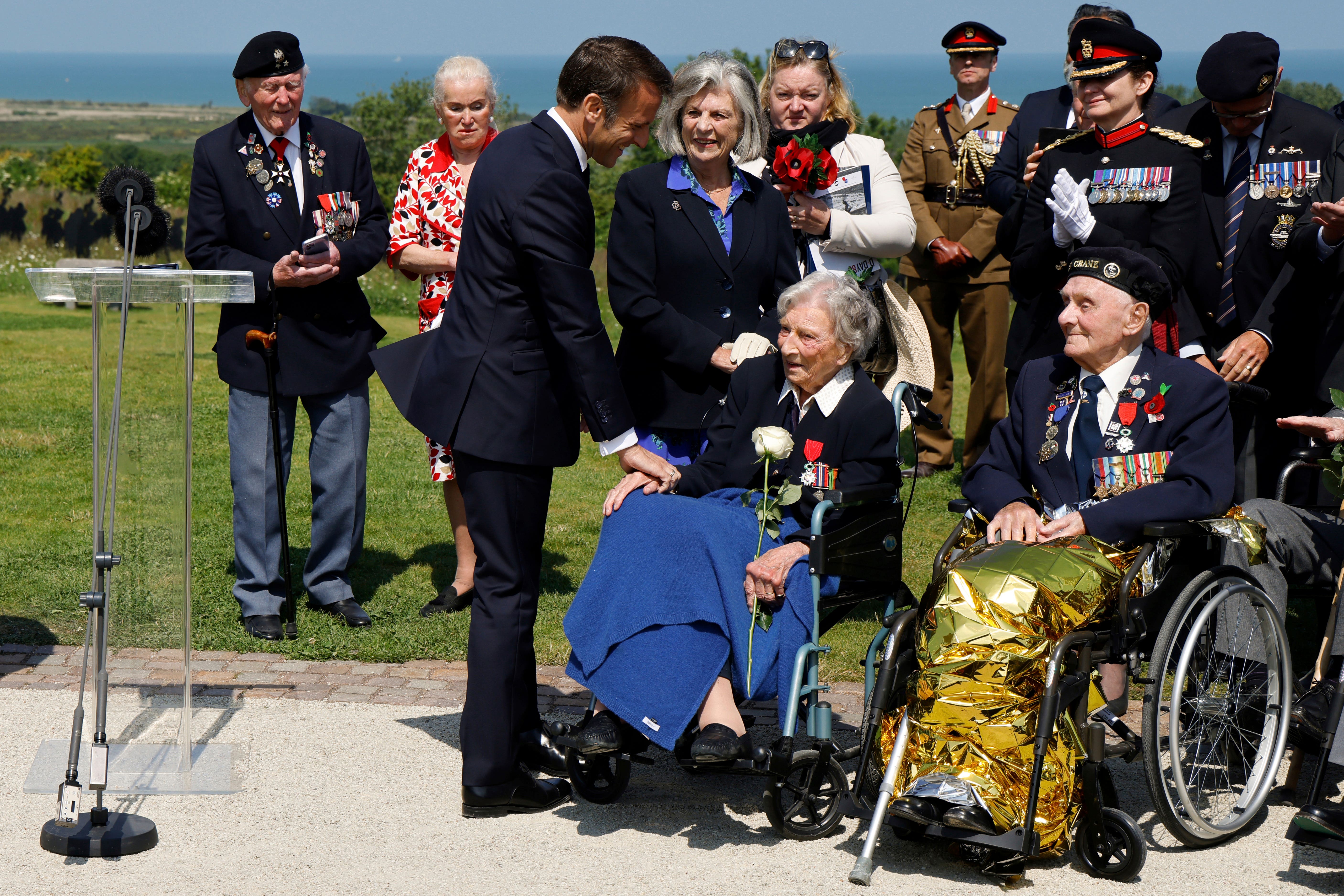 French President Emmanuel Macron awards Christian Lamb the Legion of Honour (Ludovic Marin/Pool/AP)