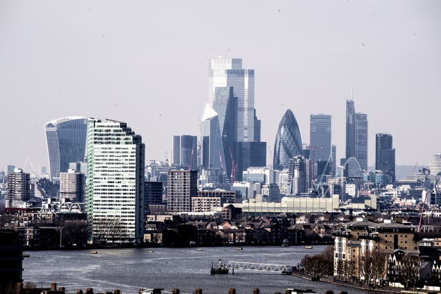 The City of London skyline seen from Greenwich Park in London. London’s top financial index was higher at the end of trading on Thursday (Ian West/PA)