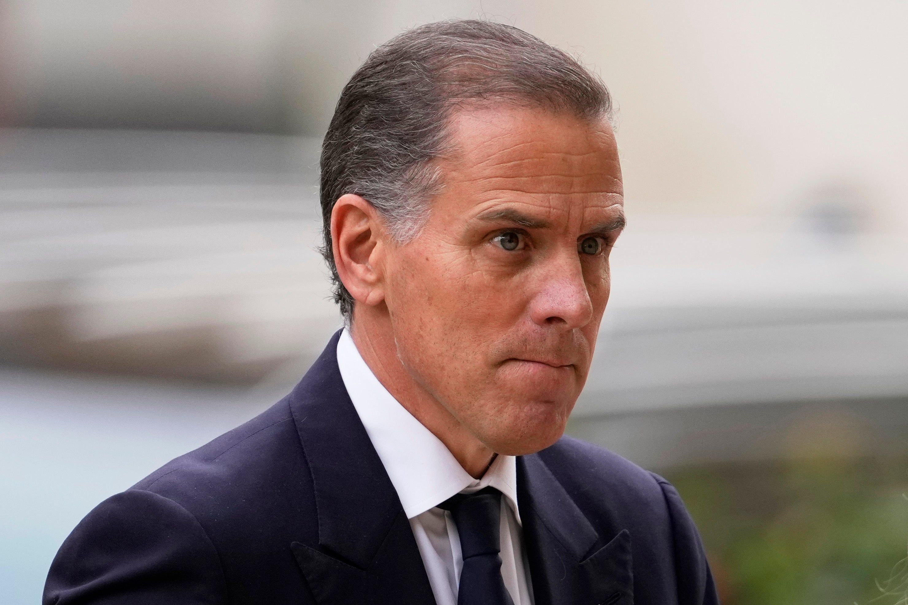 Hunter Biden pictured entering court for his trial on felony gun charges 6 June. His father, President Joe Biden, says he will not pardon him if convicted