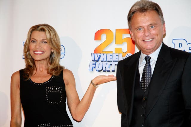 <p>Vanna White with Pat Sajak at a party in New York to mark 25 years of ‘Wheel of Fortune’ in 2007</p>