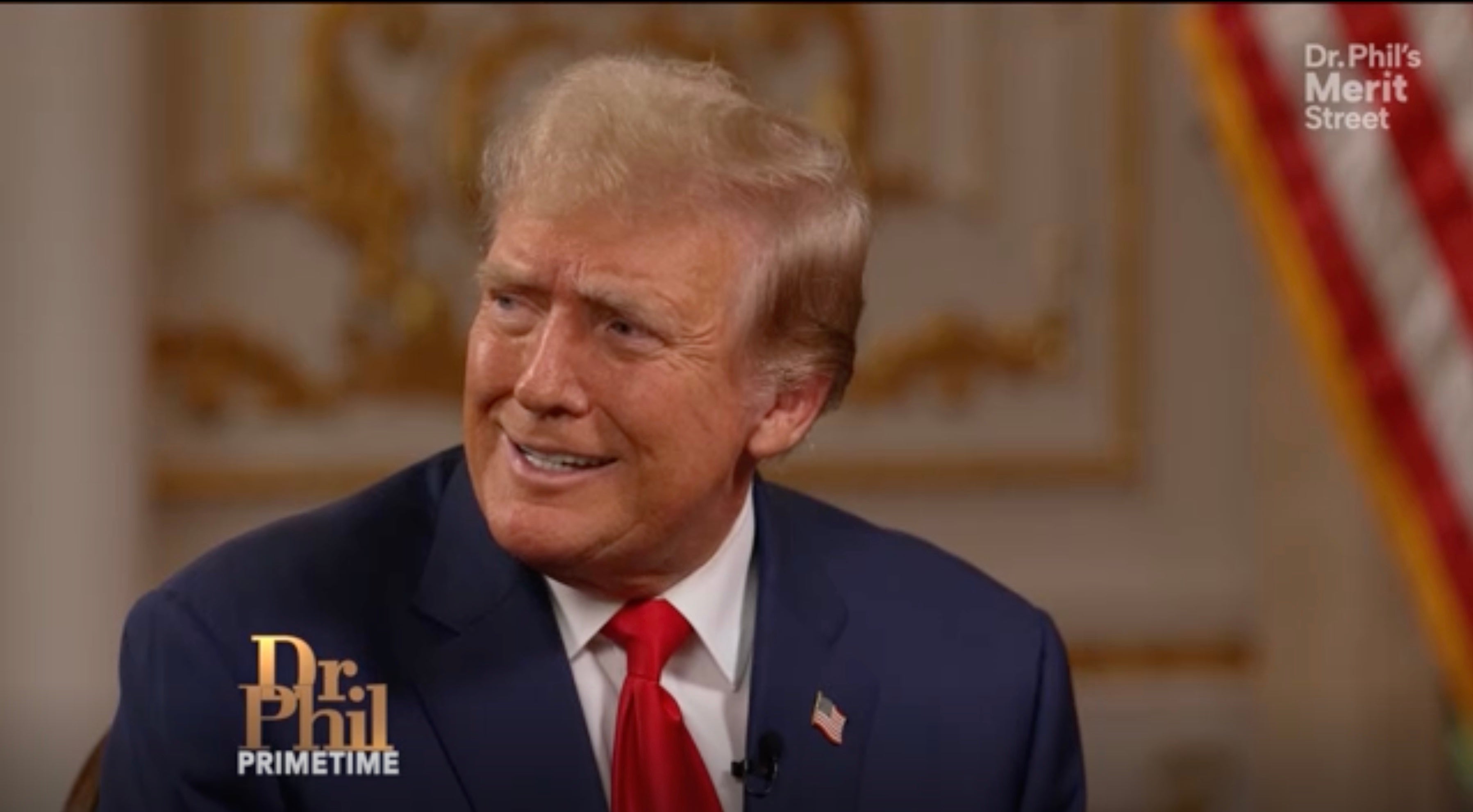 Donald Trump reacts during an interview with Dr Phil from Mar-a-Lago