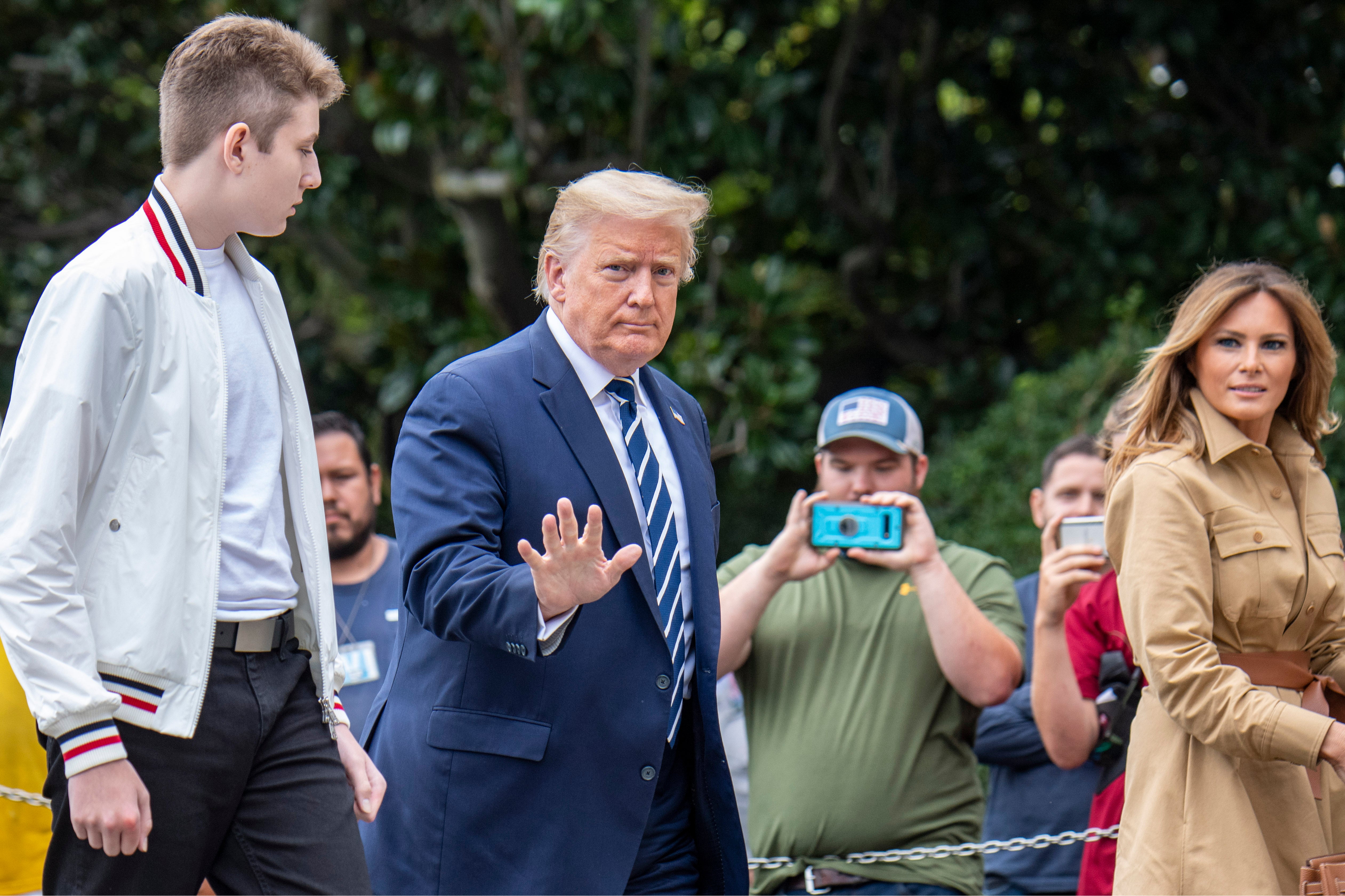 Donald Trump returns to the White House with First Lady Melania Trump and their son Baron after a weekend in Bedminster on August 16, 2020. Trumps discussed the toll the 2024 election is taking on his family during an interview with Dr. Phil.