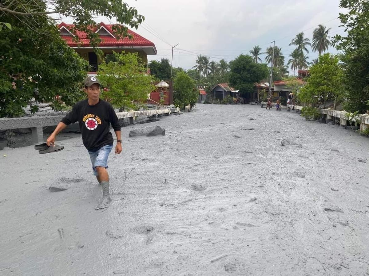 Cold lava floods Philippines village after volcano erupts miles away