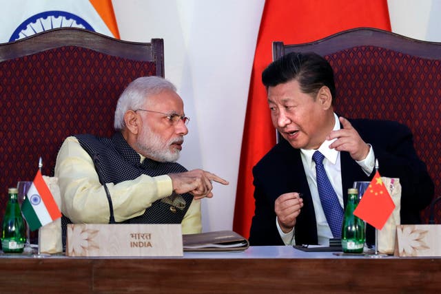 <p>Narendra Modi with Chinese President Xi Jinping at a signing ceremony by foreign ministers during the BRICS summit in 2016</p>