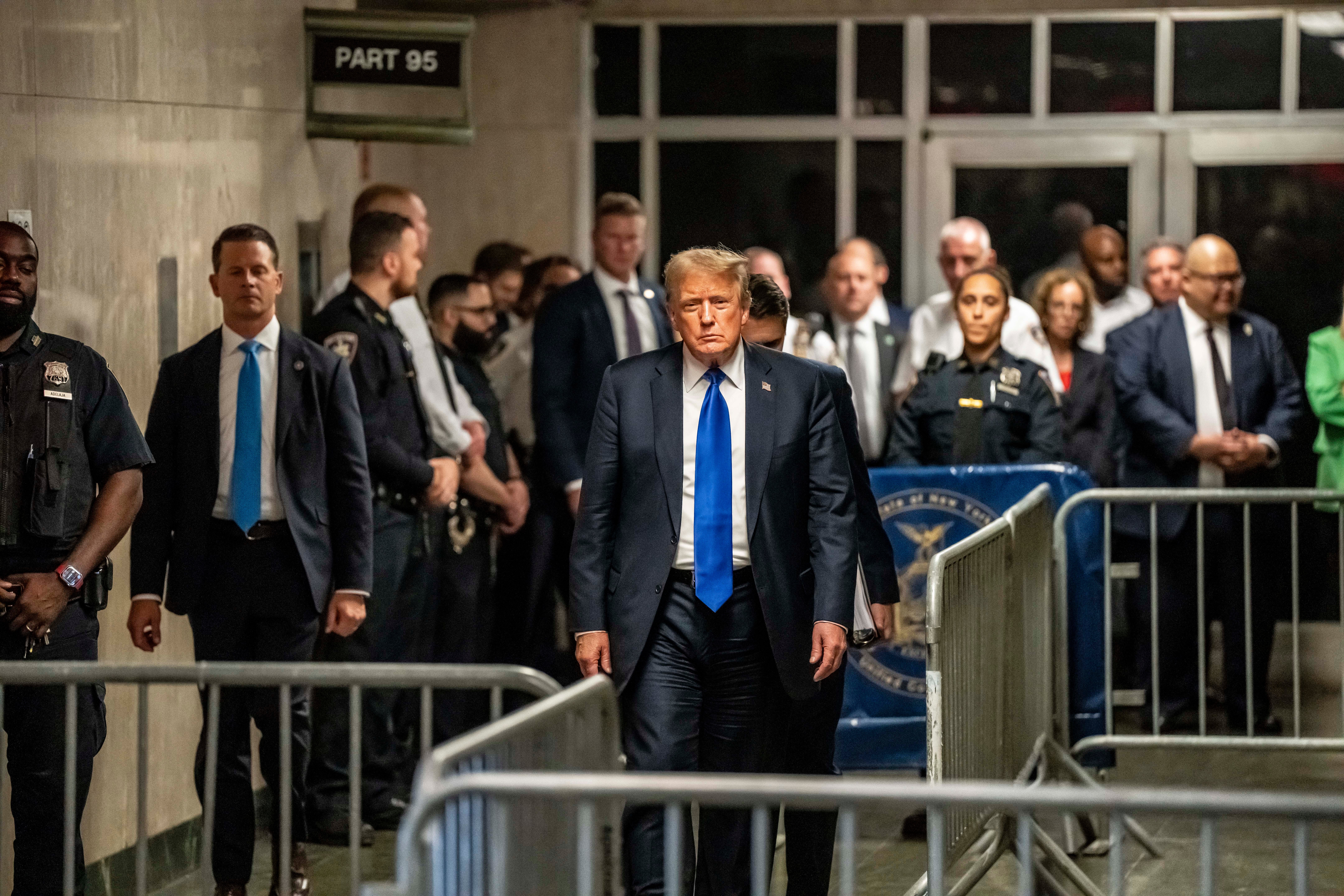 Donald Trump leaves a criminal courtroom in Manhattan after jury convicted him on 34 counts of falsifying business records