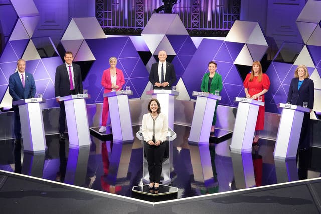 <p>Magnificent seven: a quick photo opportunity before the debate started </p>