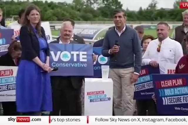 <p>Rishi Sunak laughs as GP heckles him at campaign event.</p>