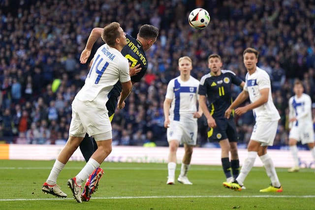 Scotland’s Lawrence Shankland, second left, scores their second goal against Finland (Owen Humphreys/PA)