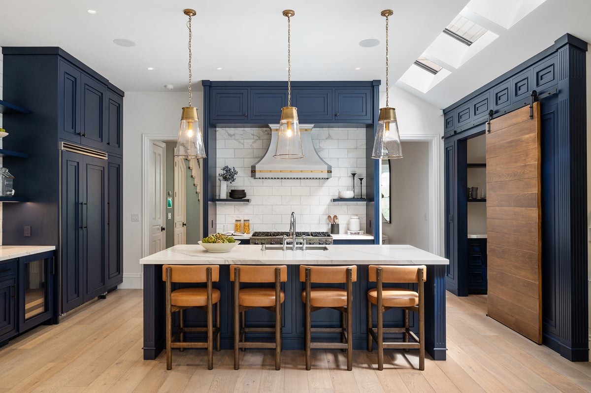 Kitchen with marble countertop. The residence at 1709 Broderick Street boasts a “timeless contemporary sophistication” with mostly light wood floors spanning its 3,7000 square feet