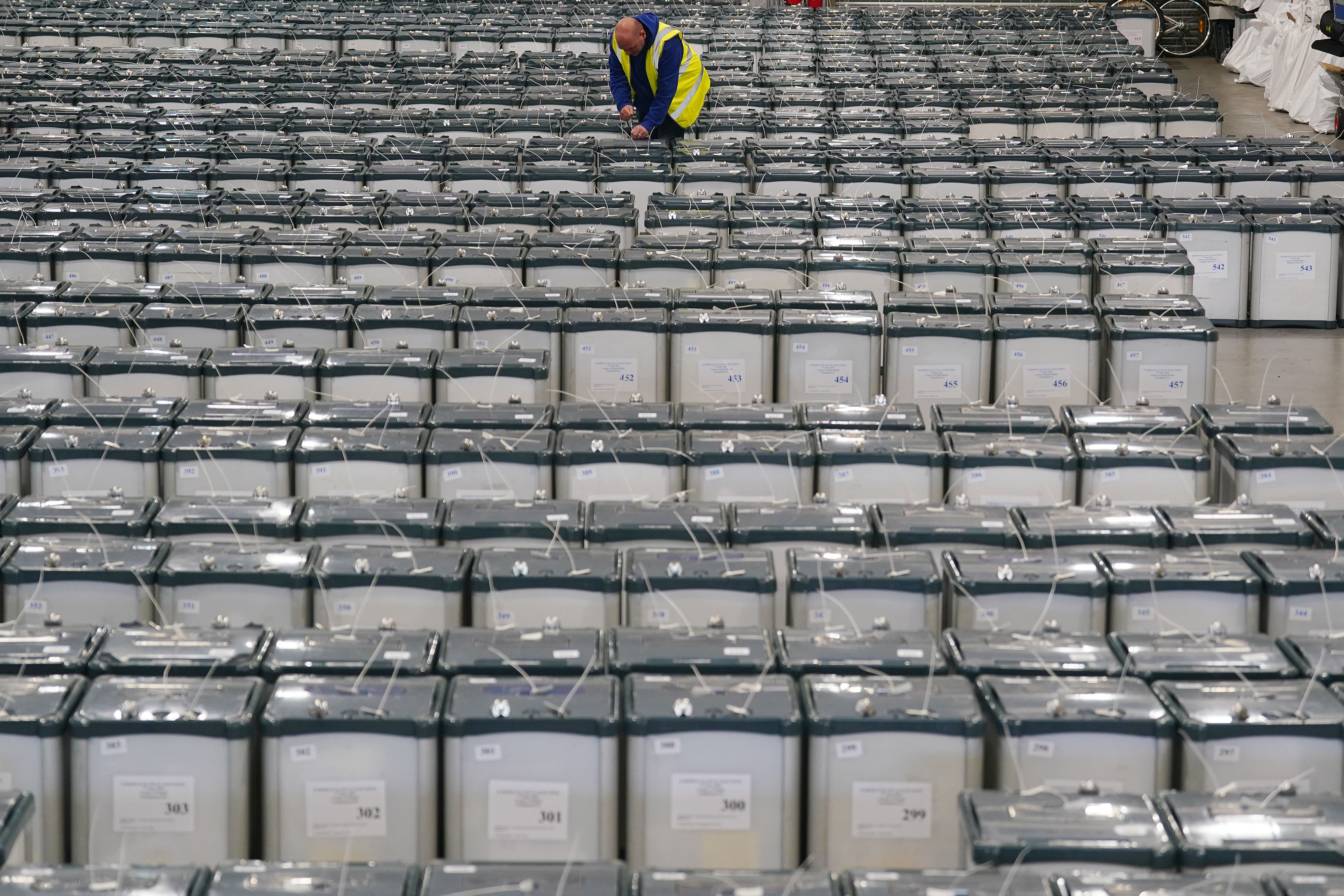 Election warehouse manager Michael Leonard among ballot boxes in Dublin (PA)