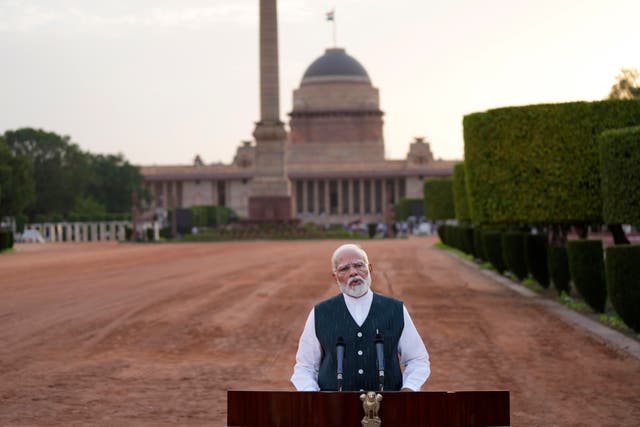 <p>Indian Prime Minister Narendra Modi speaks to the media outside the Rashtrapati Bhavan after receiving a letter from the President of India, Draupadi Murmu, inviting him to form the next central government</p>