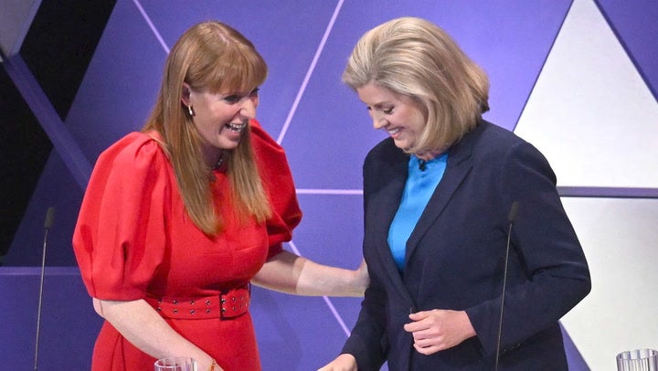 Ms Mordaunt shares a moment with Angela Rayner after the first televised debate